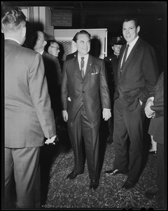 Governor Wallace standing in room with men and police