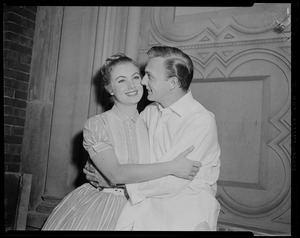 Jack Cassidy looking at Shirley Jones while embracing