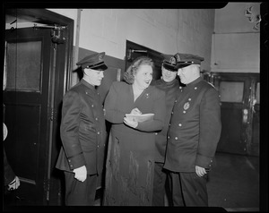 Kate Smith with three policemen