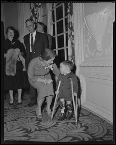Helen Hayes talking with James M[illegible] of Canton, the State Poster Boy for March of Dimes, while others look on