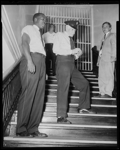 Prison guards on stairs with Deputy Sheriff Gregory Kelly