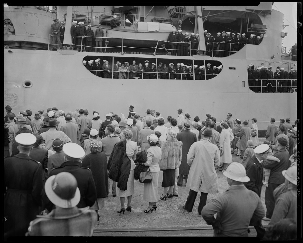 View of the crowd standing before the U.S.S. Atka