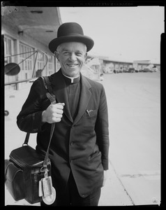 Portrait of a member of the clergy holding a bag