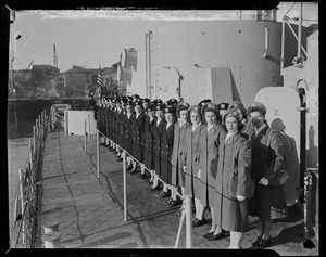 View of uniformed women, including cadet nurses, standing on the U.S.S. Higbee in two rows