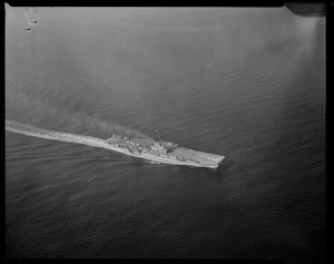 View of a damaged ship in the water from above