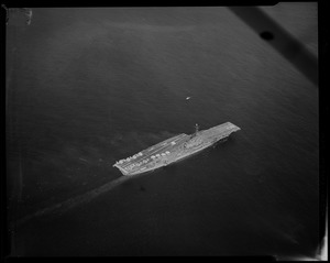 View of a damaged ship in the water from above