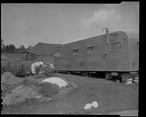 Person working outside of a mobile home