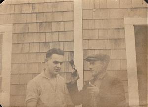 Two unidentified men, one holding paint brush, West Yarmouth, Mass.