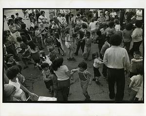 Large group of people dancing outside