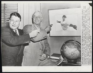 The Point Durocher's a Dodger Again--Branch Rickey, Jr.,(left) and Burt Shotton put the finger on a picture of Leo Durocher here today as Rickey announced Durocher will manage the 1948 Brooklyn Dodgers. Shotton was named supervisor of Dodger farm club managers. Neither Branch Rickey, Sr., president of the Dodgers. nor Durocher was present when the announcement was made.