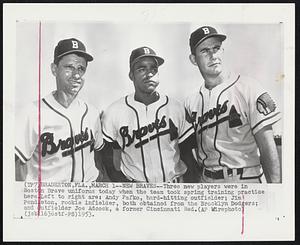 New Braves--three new players were in Boston Brave uniforms today when the team took spring training practice bare. Left to right are: Andy Pafko, hard-hitting outfielder; Jim Pendleton, rookie infielder, both obtained from the Brooklyn Dodgers; and outfielder Joe Adcock, a former Cincinnati Red.