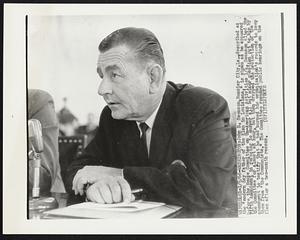 John D. Swenson, Bossier City, La., described as the "modern day father of the Klan in Louisiana," is shown as he appeared before the House Committee on Un-American Activities 1/4. Swenson cited the Fifth Amendment in refusing to answer all but minor questions put to him by the Committee for almost an hour, but then dropped the protection of the amendment to testify that he had burned his organization's records to keep them from "the Communists." The Committee resumed public hearings on the Klan after a two-month recess.
