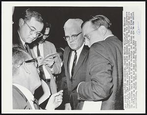 Sheriff Marion Millis, of New Hanover County, N.C. (2nd from right) talks with newsmen following his appearance before House Un-American Activities Committee 10/26. He testified before the committee that he and 6 of his deputies and joined the Ku Klux Klan in 1963,but he said they had done so merely to keep an eye on the secret organization.