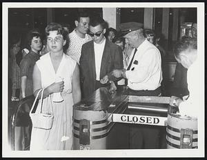 MTA Fares Refunded – Sober-faced MTA patrons, caught in Park street station when strike went into effect, filed in bewilderment out of station and were refunded their fares. There were similar scenes throughout city.