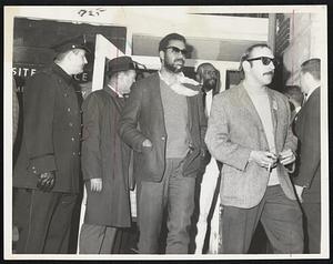 Take-Over Ends at South End BRA office. Leaders are escorted out by police after 10-hour sit-in.