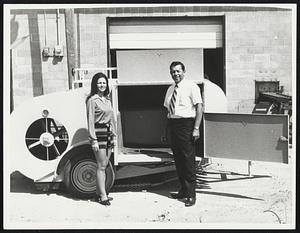 Looking for Work. Lubbock, Texas: N.A. Mattison, 43, poses with his "Litter Gitter," a machine he designed to take the backache out of picking up litter along the nation's highways. It sells for $3,950. On hand for the occasion is Dolores Salas, who is "Miss Lubbock."