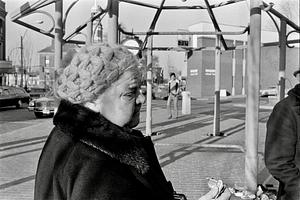 Lady buying her Chelsea Record, Bellingham Square