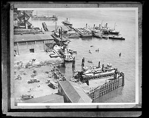 Ships docked by an unidentified wharf