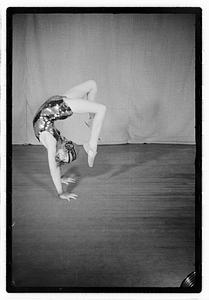 Girl acrobat in costume