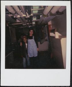 Pair posing in basement
