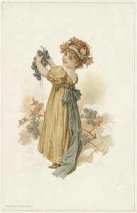 Little girl with grapes