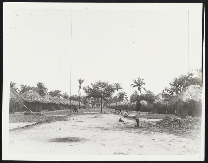 Chicago Street in Africa. This is Chicago street in the Bibanga Leper Camp, located in Africa's Belgian Congo. All the houses on this street were built from funds donated by Protestant churches in America's second largest city, hence the name.