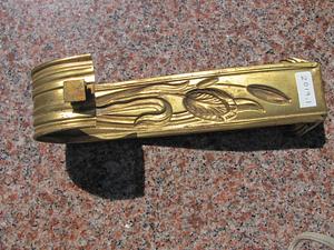 Brass curved drapery tie-back