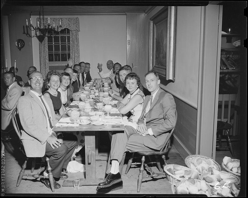 Alumni group seated at a table