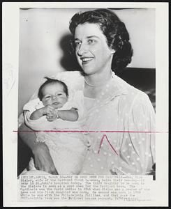 May Be Good Omen For Cardinals--Mrs. Dick Sisler, wife of the Cardinal first baseman, holds their two-day-old baby in St. John's hospital today. The third daughter to be born to the Sislers is seen as a good omen for the Cardinal team. The Cardinals won the World series in 1946 when Sisler was a member of the team and his first daughter was born. He second was born in 1950 while he was with the Philadelphia Phillies, and that year the Philadelphia team won the National League pennant.