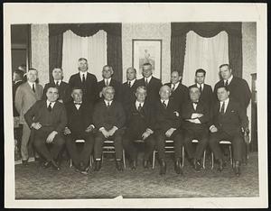 Baseball Chiefs at Annual American League Meeting in New York City- This, the first group photo of the annual gathering of baseball's leaders this year, shows (left to right)-: Seated:-- E. G. Barrow; P. D. C. Ball of St. Louis; Walter Fritsch, St. Louis; Ban B. Johnson, president American League; F. J. Navin, Detroit; Col. Jacob Ruppert, new sole owner of New York Yankees; and Harry H. Frazee of the Boston Club. Standing:-- Walter McNichols, Cleveland; Robert Quinn, St. Louis; Connie Mack, Philadelphia; Clark Griffith, Washington; W. M. Richardson, Wash.; E. S. Bernard, Cleveland, Thos S. Shibe, Phila., Harry Grabiner, Chicago., Louis Comiskey of Chicago. ---- Nothing startling is looked for at the annual meeting of the American League which opened up today at the Hotel Belmont, New York--but then you can never tell.
