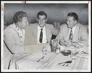 Snowed In as far as baseball is concerned were, left to right, Jacky Jensen, Mickey Grasso and Frank Shea of the Washington Senators as they dined leisurely at the Hotel Kenmore after learning that season’s opener with the Red Sox at Fenway Park today had been postponed because of the weather.