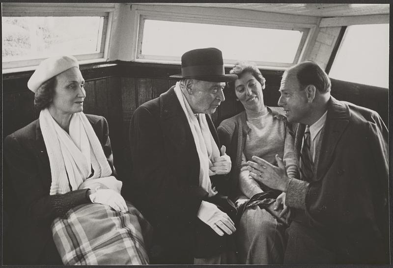 Olga and Serge Koussevitzky seated next to an unidentified man and woman on a boat