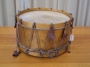 Wooden drum with leather details