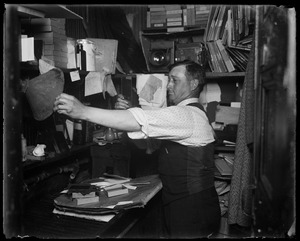 Prof. Leslie Jones in his historic old darkroom in "hypo row" - Herald Traveler