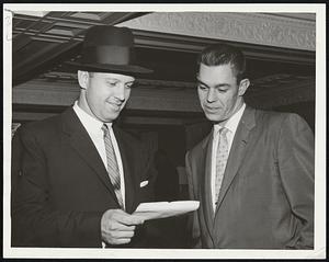 First Baseman Vic Wertz and Pitcher Art Houtteman of the Cleveland Indians shoot the breeze at Hotel Kenmore before leaving for Fenway Park. The Red Sox and Indians were starting a five-game series with a day-night doubleheader.