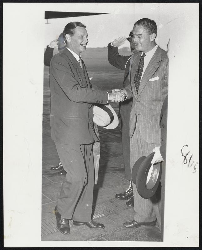 Tobin Welcomed to Berlin – U.S. Secretary of Labor Maurice J. Tobin (left) is greeted by Edward Page, an official of the U.S. High Commission to Germany, upon his arrival at Tempelhof Airfield, Berlin.