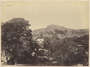 Old Gaya from the outskirts looking west. Brahmajuni hill & temple in the distance