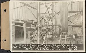 Contract No. 85, Manufacture and Delivery of Precast Concrete Steel Cylinder Pipe, Southborough, Framingham, Wayland, Natick, Weston, view showing crimping machine, bell and spigot ring fabrication plant, Natick, Mass., Nov. 10, 1939