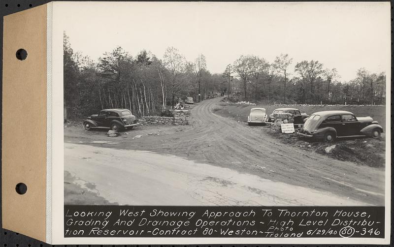 Contract No. 80, High Level Distribution Reservoir, Weston, looking west showing approach to Thornton house, grading and drainage operations, high level distribution reservoir, Weston, Mass., May 29, 1940