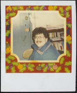 Smiling man in winter-themed frame
