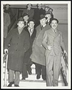 Aviators To Appear Before Grand Jury New York Jan. 14 - Bert Acosta and Gordon Berry, Ace American Aviators who fought for Spanish government in the Civil War, were served with Subpoenas to appear before the Federal Grand Jury when they returned today abroad the S.S. Paris. L to R; United States Attorney Gregory Noonan, Major Gordon Berry, Lewis Landis, Attorney for Acosta and Acosta