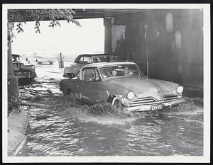 Familiar Trouble Spot under Boston & Albany railroad bridge on Storrow Drive looked like this yesterday afternoon. Mud and debris from tree removed on Soldiers Field road contributed to flood by clogging storm drains.