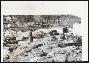 Widespread ice and Flood Damage at Hartford, Vt., after huge ice cakes and swirling backwaters from White River tore into parking lot, spreading havoc among more than 100 cars and rucks.