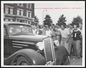 GE Foremen are Booed as they drive past line of pickets at the company's Lynn plant after having stayed in the plant for two days.