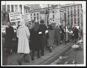 State House Pickets demand an end to atomic weapons development and testing. More than 200, most of them college students, turned out in a demonstration which paralleled a protest march in front of the White House in Washington.