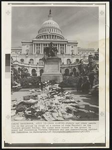Blue Printer--Medals and other awards lie on the ground in front of a statue of John Marshall on the Capitol grounds Friday. The items were tossed to the ground by angry and dissenting Vietnam Veterans who are demonstrating against the Indochina in Washington.