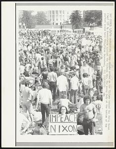 Young people gather on the Ellipse behind the White House (top) 5/9 to demonstrate against the Vietnam War. The young lady at the bottom of the picture would have Pres. Nixon impeached.