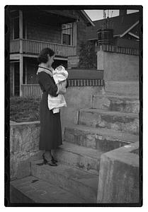 Mercedes Pasarell Sanromá holding a baby