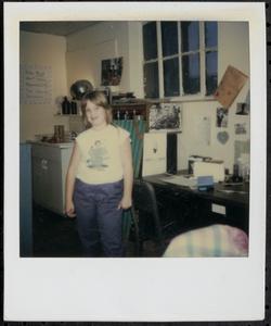 Young person wearing a cutoff shirt
