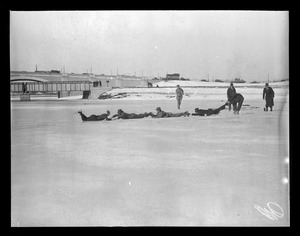 Men on skates form chain on ice